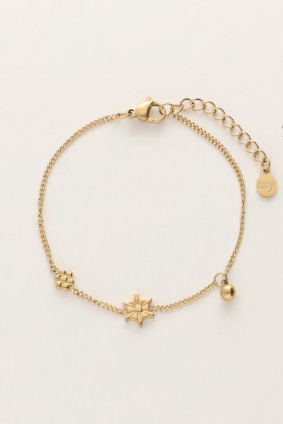 Minimalistische armband met bloemen & balletje