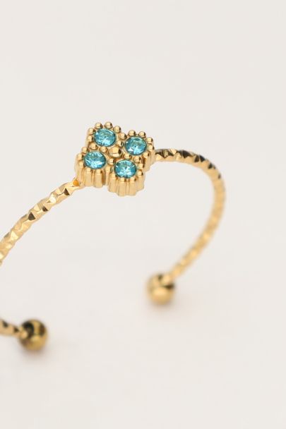 Minimalist ring with clover and light blue rhinestone