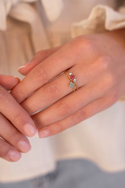 Minimalist ring with clover and light blue rhinestone