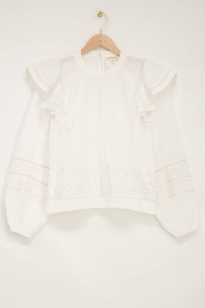 White embroidered blouse with shoulder ruffle