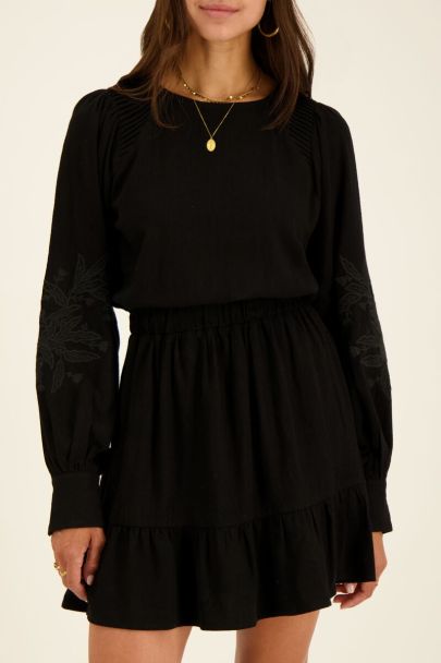 Black wrap dress with embroidered sleeves