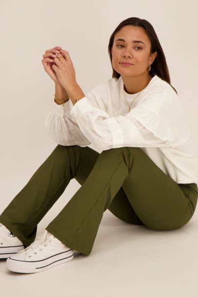 Green flared corduroy trousers