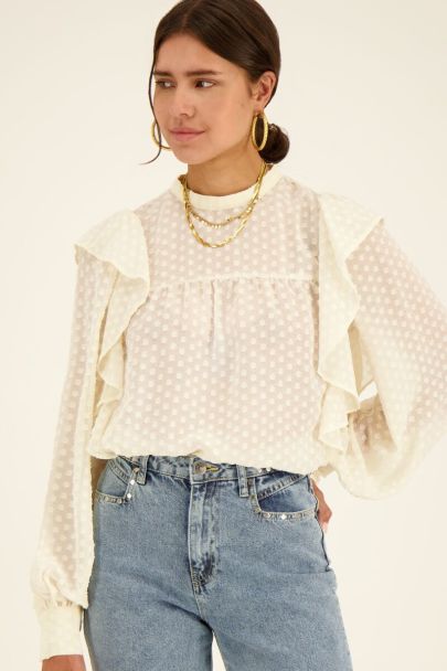 White polka dot blouse with ruffles