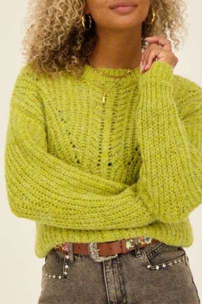 Pull vert en maille ajourée