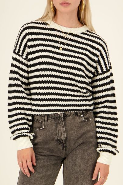 Black-white sweater with structured stripes