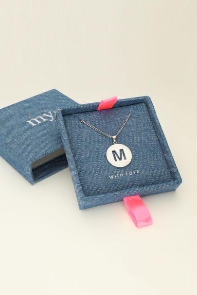 Necklace with open initial