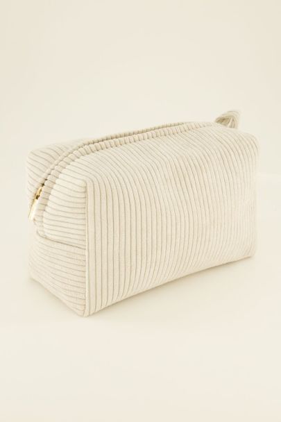 Beige toiletry bag with rib texture
