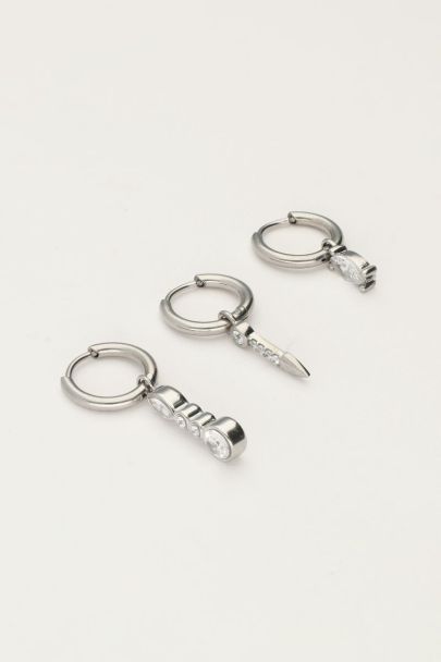 Set of three hoop earrings with charms and silver stones