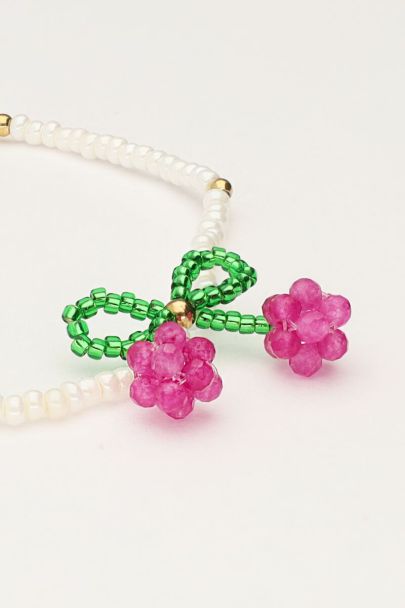 Bracelet en perles blanches avec cerise
