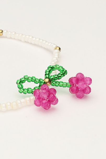 White beaded bracelet with cherry