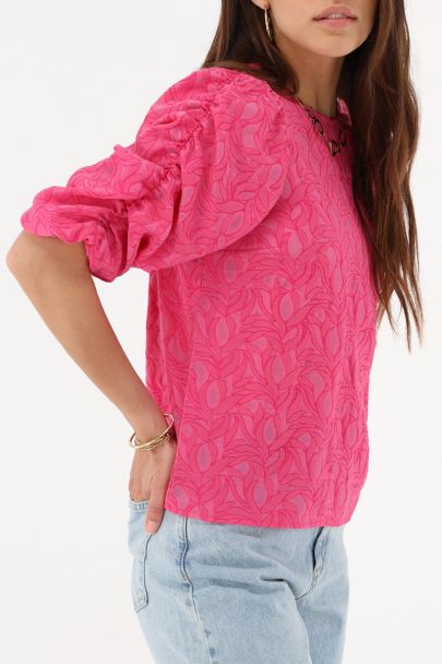 Roze jacquard top met pofmouwen en strikjes