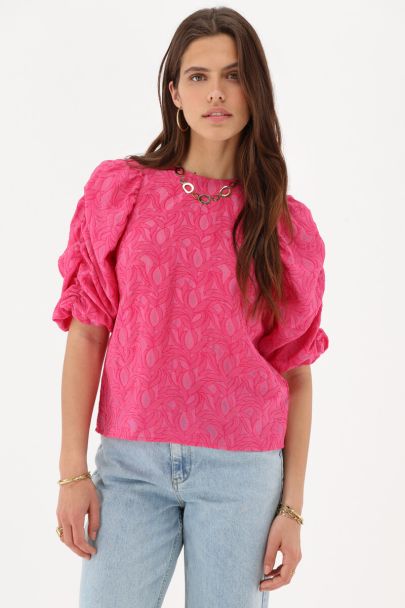 Roze jacquard top met pofmouwen en strikjes