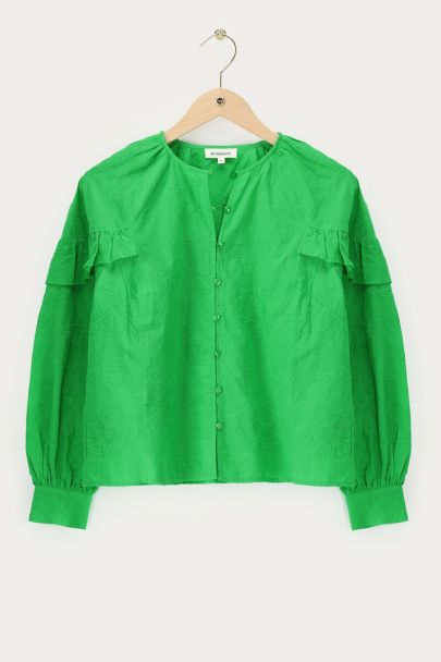 Grünes Oberteil mit Rüschen und Stickereien 