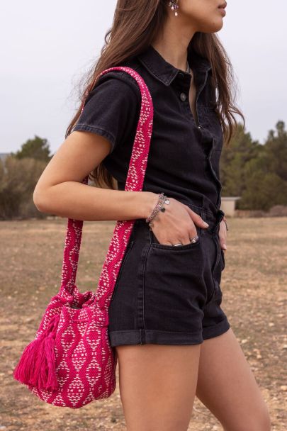 Pink round shoulder bag with woven Aztec print