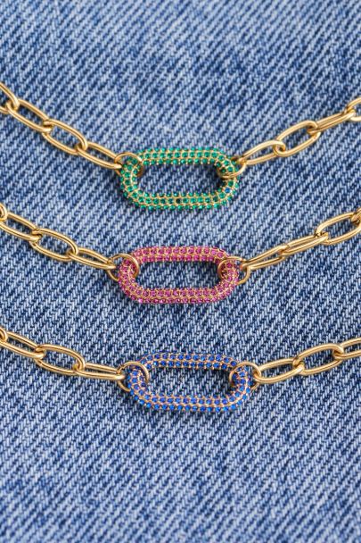 Gliederarmband mit grünem Strassanhänger