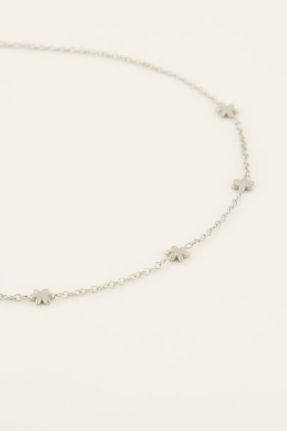 Necklace with multiple flowers