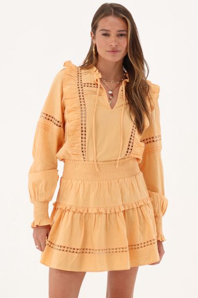 Orange blouse with ruffles & flowers