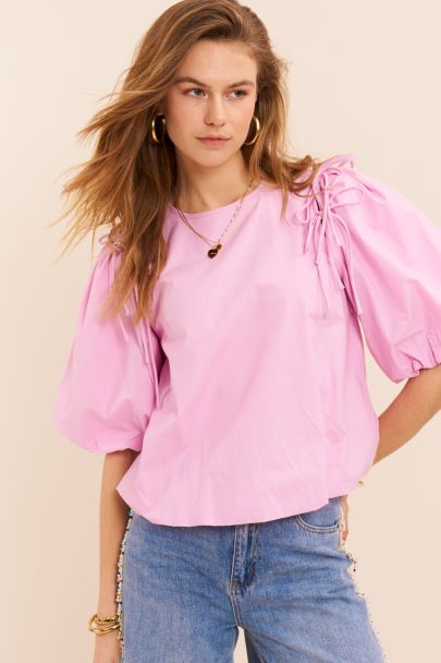 Roze ballon top met strikjes en pofmouwen