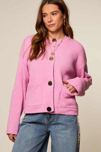 Pink knitted cardigan with gold-coloured buttons