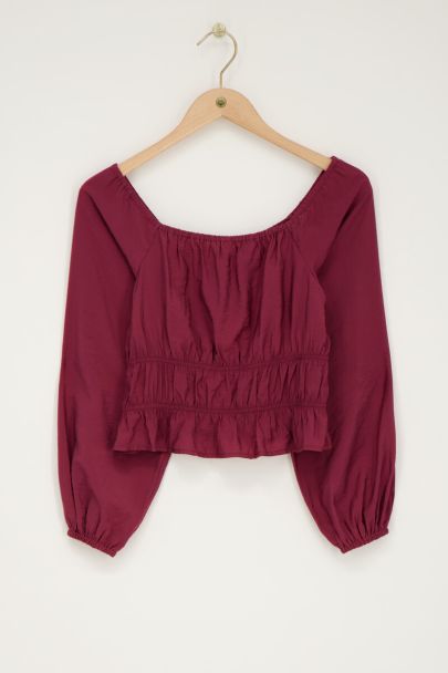 Lilafarbenes schulterfreies Oberteil mit Rüschen