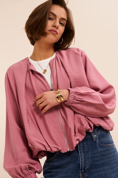 Roze top in ballon look met rits