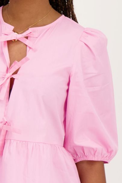Pink top with bows and puff sleeves
