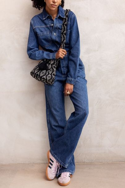 Dark blue denim jumpsuit with long sleeves