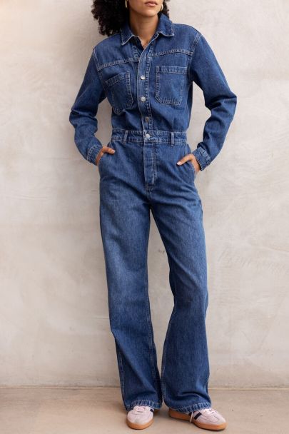 Donkerblauwe denim jumpsuit met lange mouwen