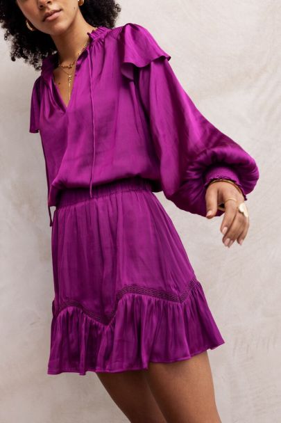 Purple blouse with ruffles and satin look 