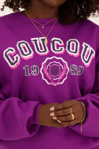 Paarse sweater coucou