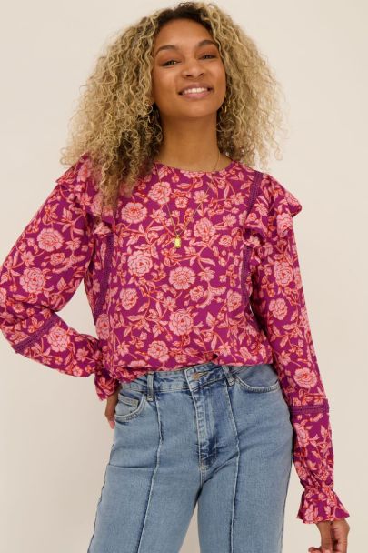 Purple ruffled top with pink floral print