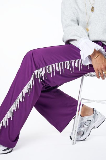 Pantalon large violet avec perles fantaisie 