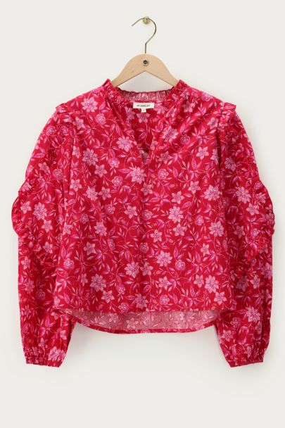 Red blouse with ruffles