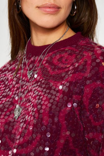 Pull en jacquard rouge avec paillettes
