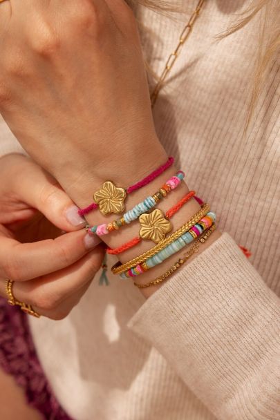 Art oranje koord armband met bloem