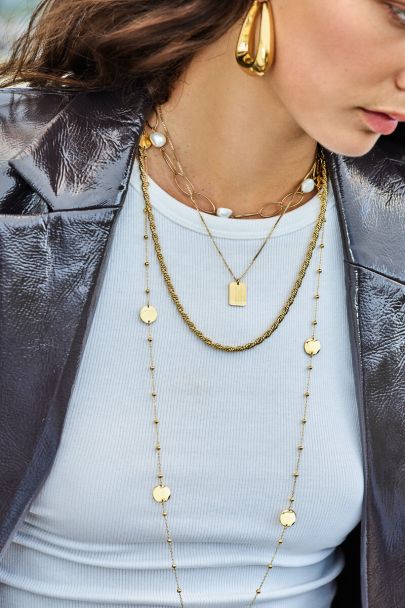  Bold necklace with embrace pendant