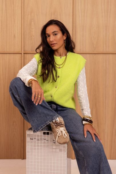 Limegroen gilet met fancy knopen