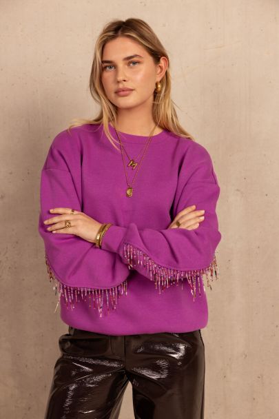 Paarse sweater met gekleurde kralen franjes