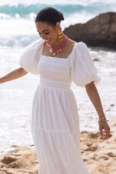 Witte maxi jurk met smock en pofmouwen