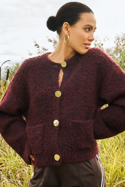 Brown bouclé cardigan with buttons and pockets