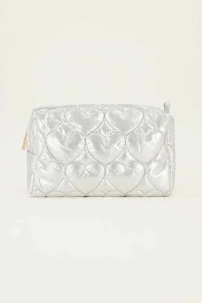 Silver coloured toiletry bag with padded hearts