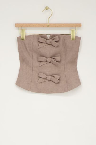 Top bustier beige avec nœuds