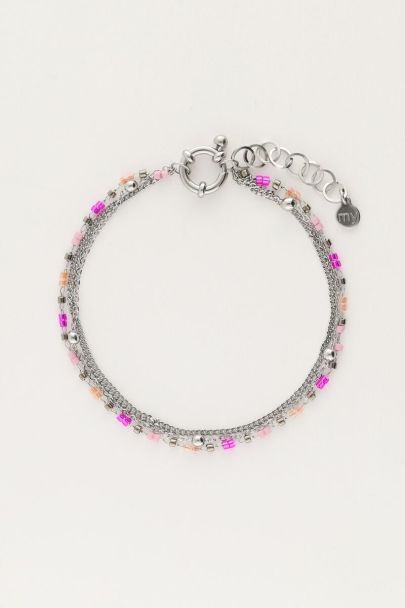 Triple bracelet with pink beads