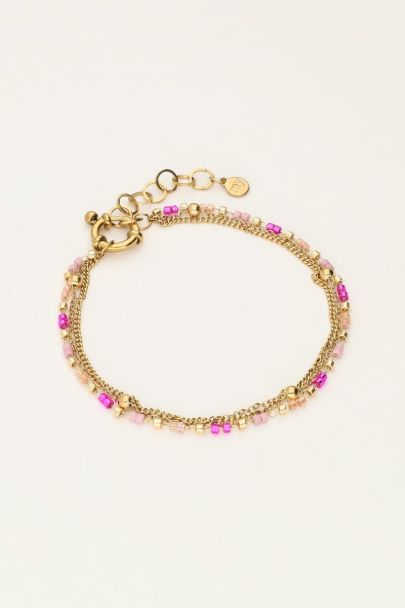 Driedubbele armband met roze kralen 
