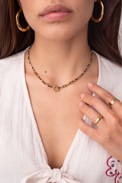 Triple necklace with black beads
