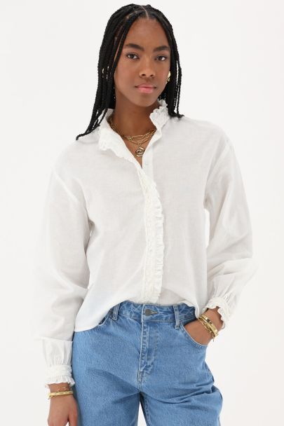 Witte blouse met ruffles