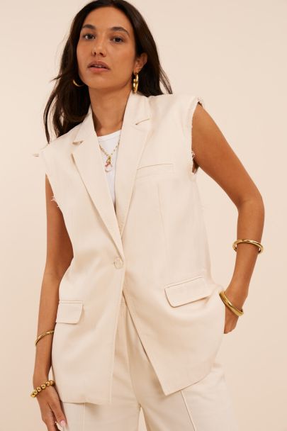 White gilet with stitching