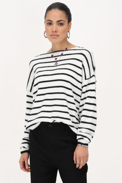 White sweater with black stripes