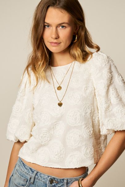 Witte kanten top met rozen en korte pofmouwen