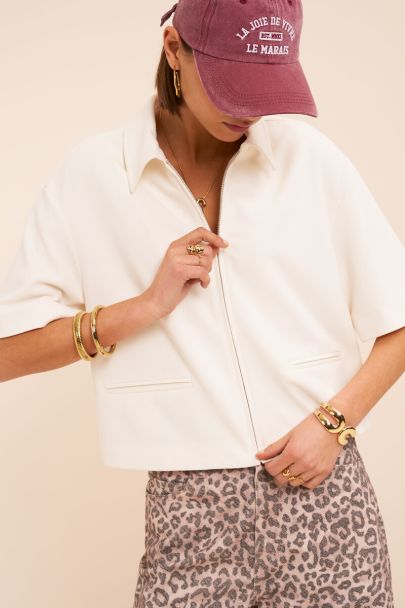 Polo zipp&eacute; blanc &agrave; manches courtes 